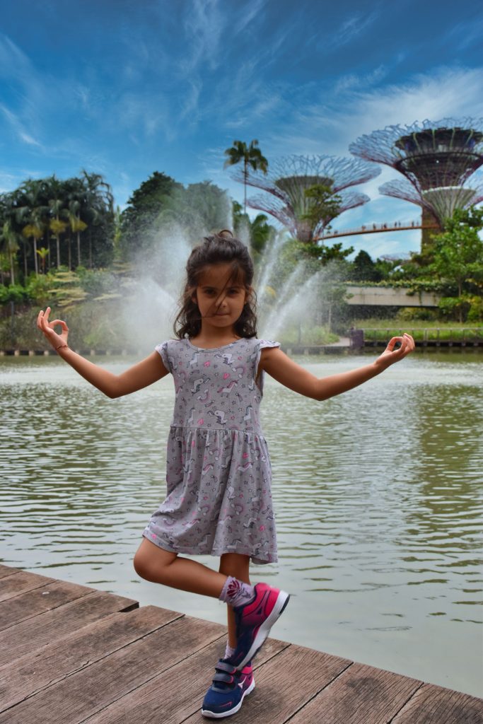 Yoga in front of the supertrees, Garden of the Bay, Singapore