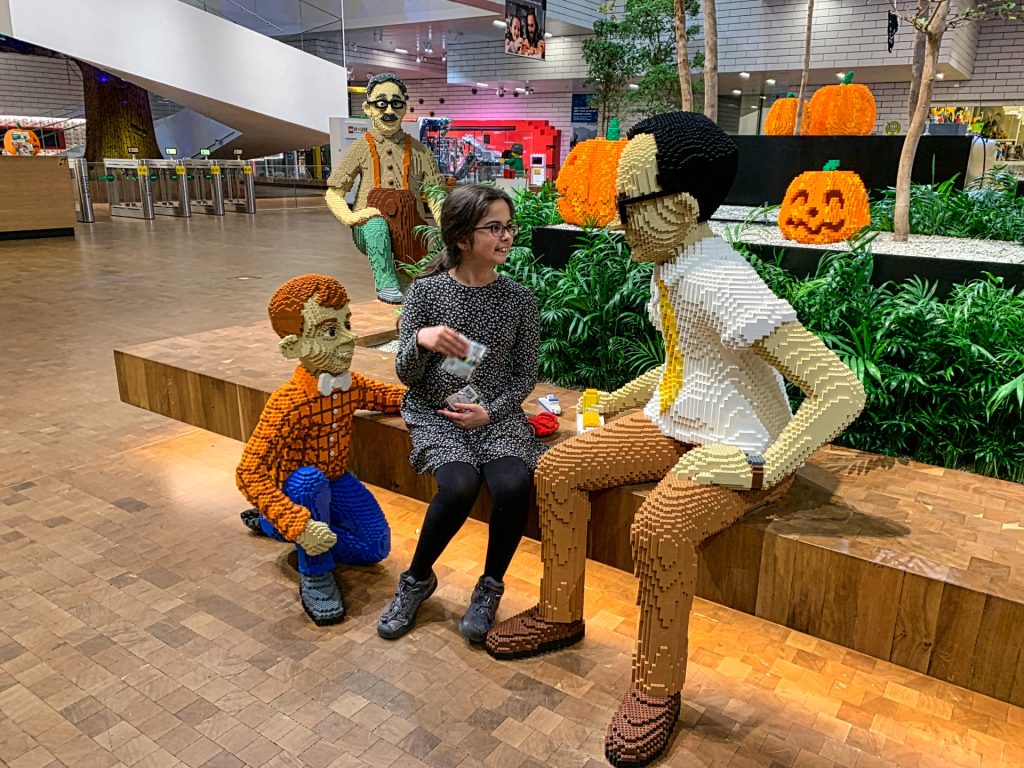 Kiara speaking to Lego characters