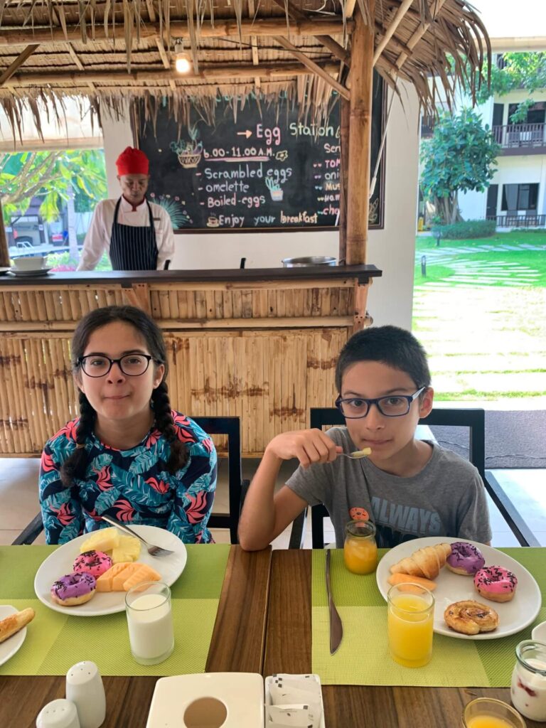 Kids having a breakfast in an hotel